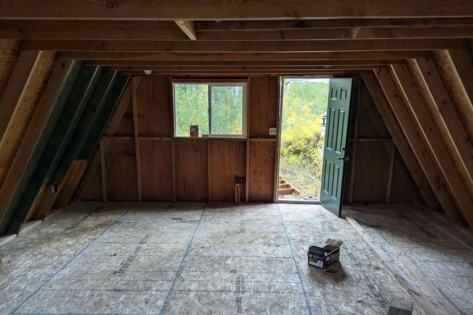 Timber framing and subfloor during a structural remodel